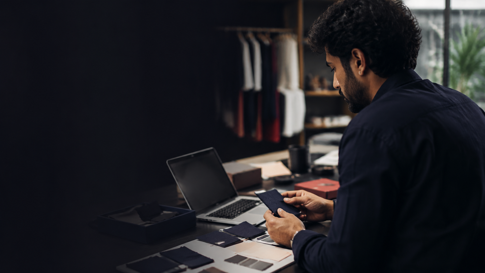 A founder working in a modern creative studio